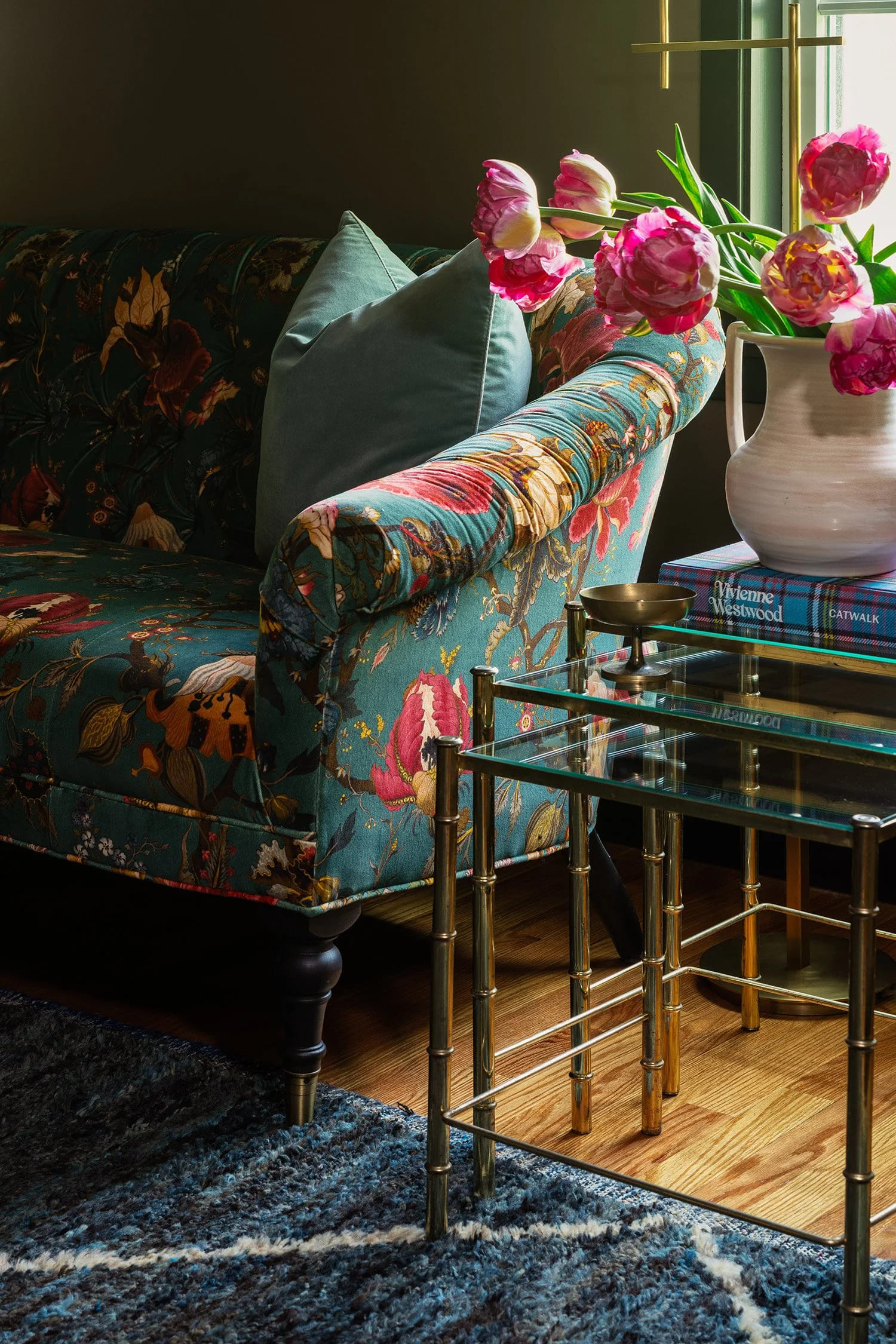 floral couch paired with pink flowers.jpg